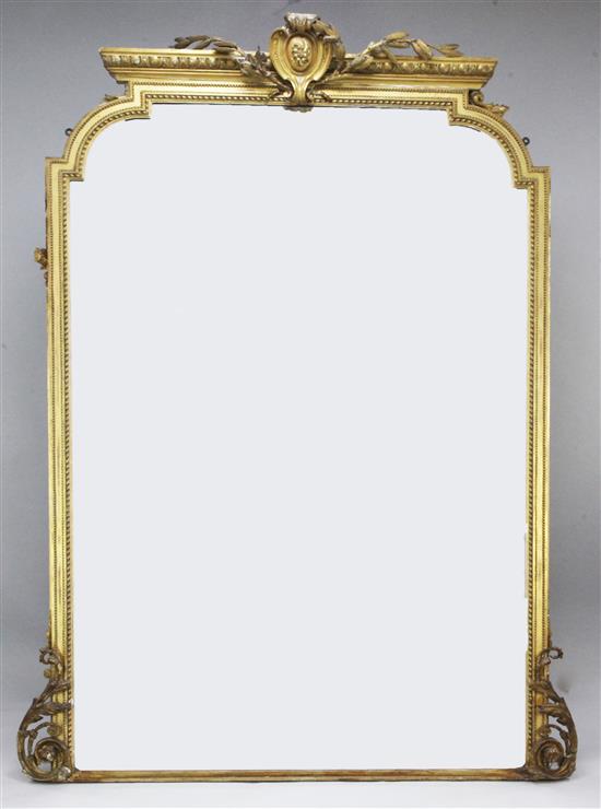 A large Victorian giltwood and gesso overmantel mirror, 7ft 6in. x 5ft 3in.